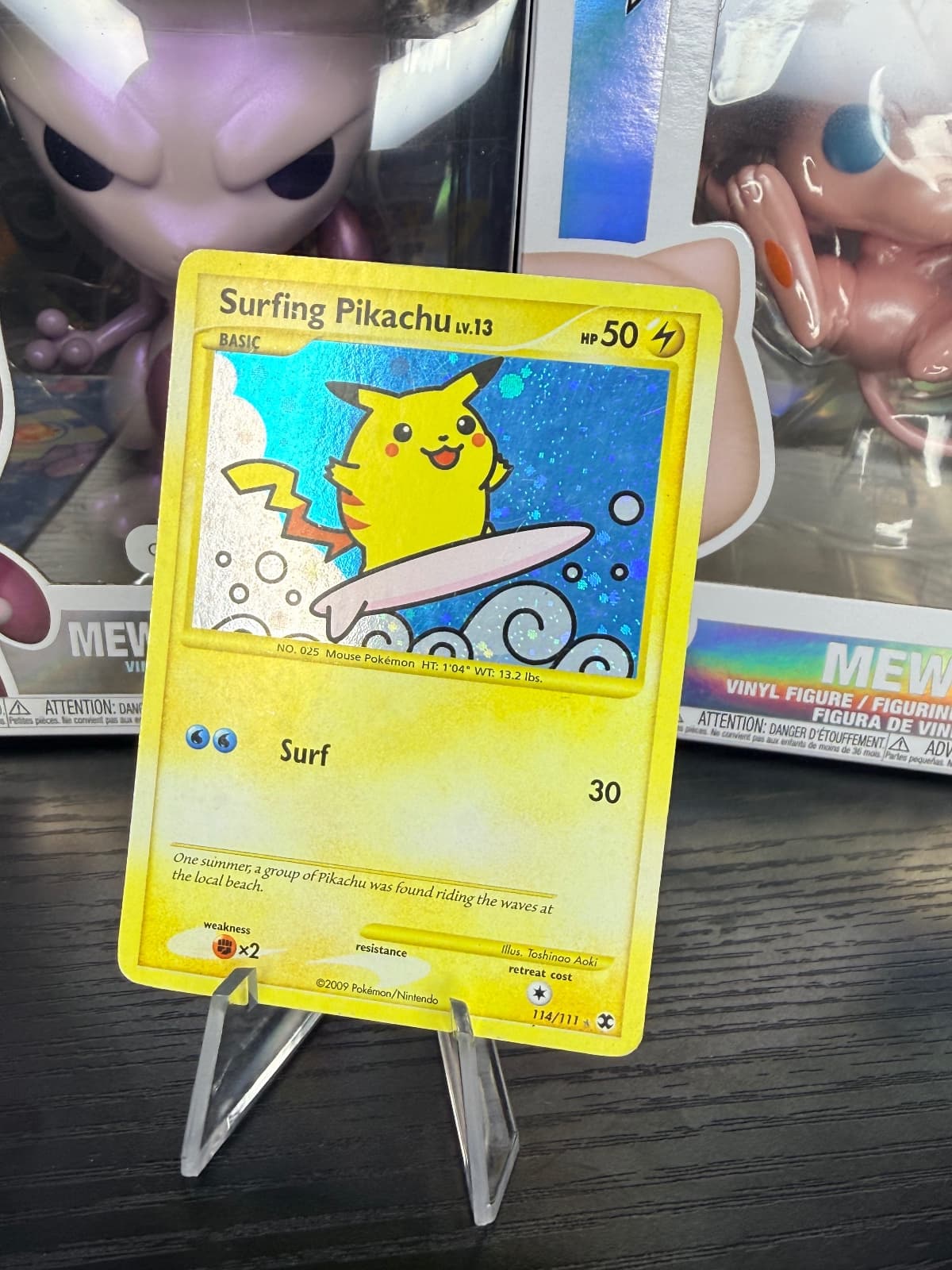 Surfing Pikachu 114/111