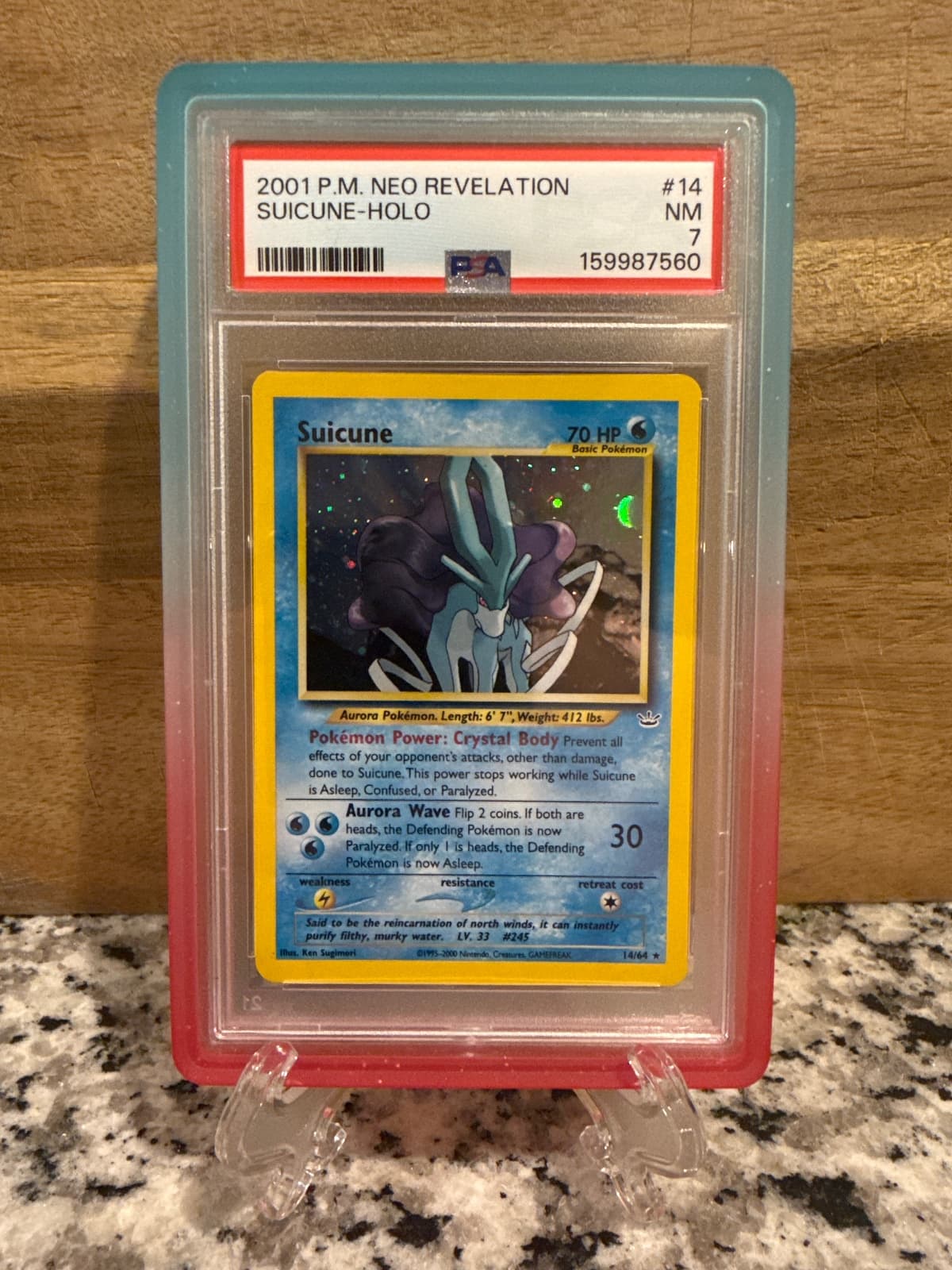 2001 P.M. Neo Revelation Suicune Holo 14/64 PSA 7
