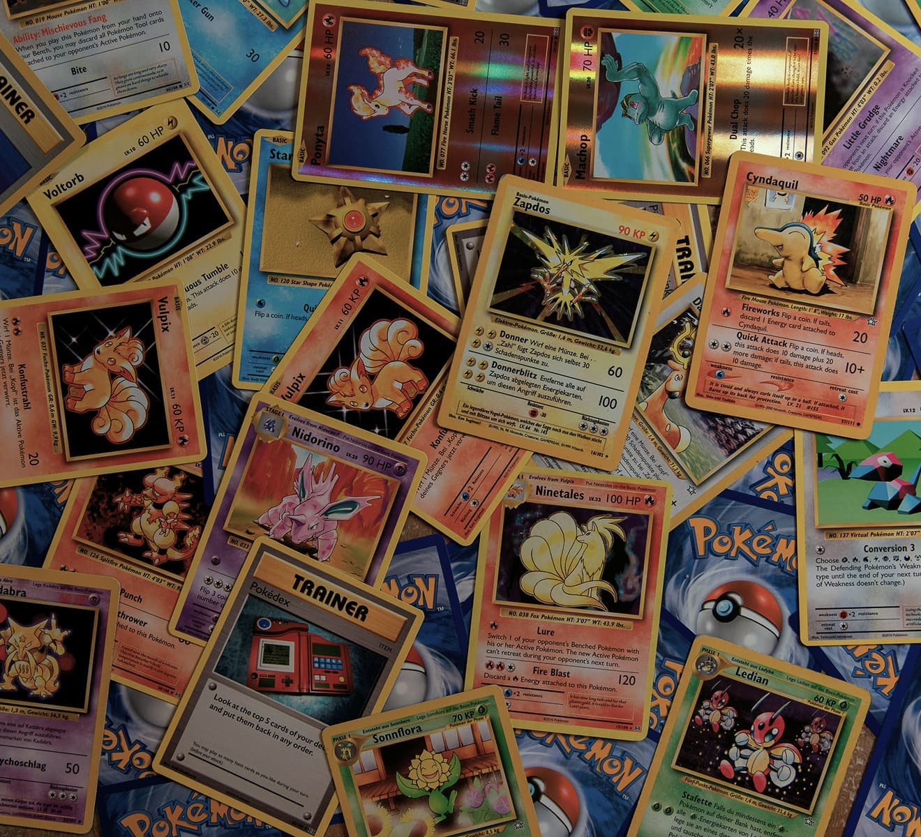 A pile of pokemon cards